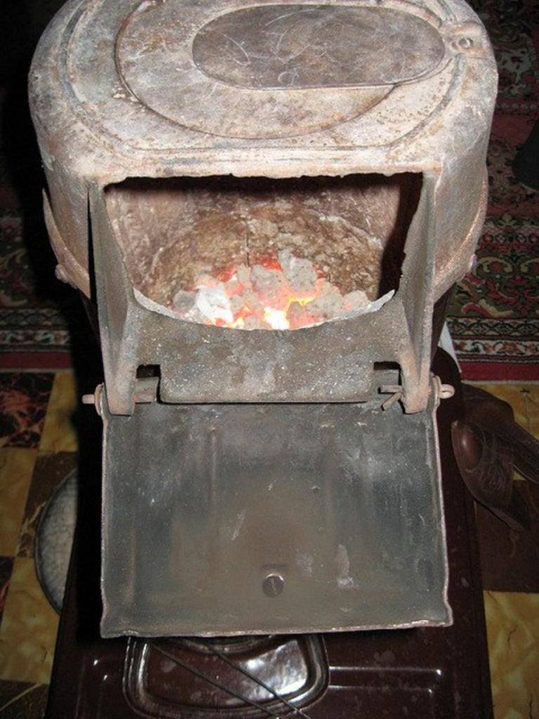 How to Start a Coal Stove Fire - Dengarden