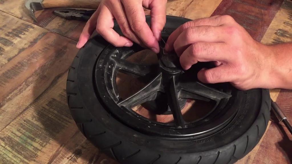 How to Replace the Locking Pin on a Mountain Buggy Wheel (Older Model) - YouTube