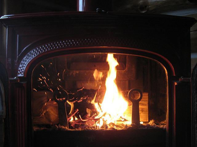 6 Simple Ways To Get More Heat From Your Wood Stove - Off The Grid News