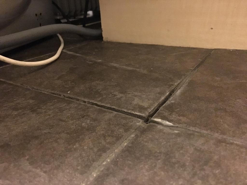 Got water under kitchen floor tiles