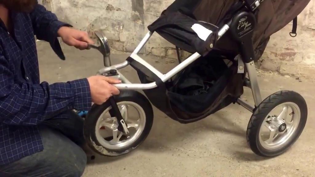 How to Repair a Wobbly Front Wheel on a BabyJogger City Elite - YouTube