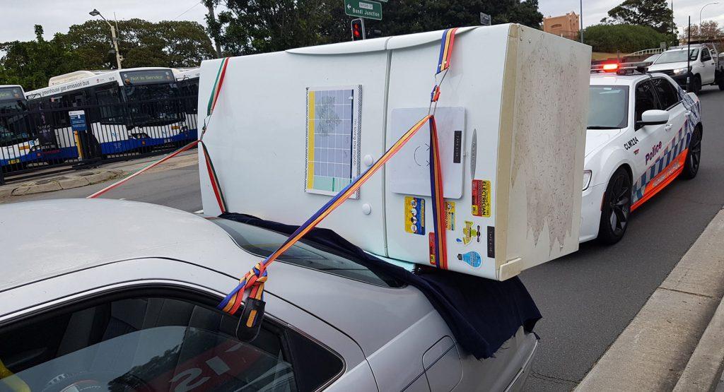 Aussie Tries To Carry Fridge On A Toyota Camry, Police Aren't Impressed | Carscoops